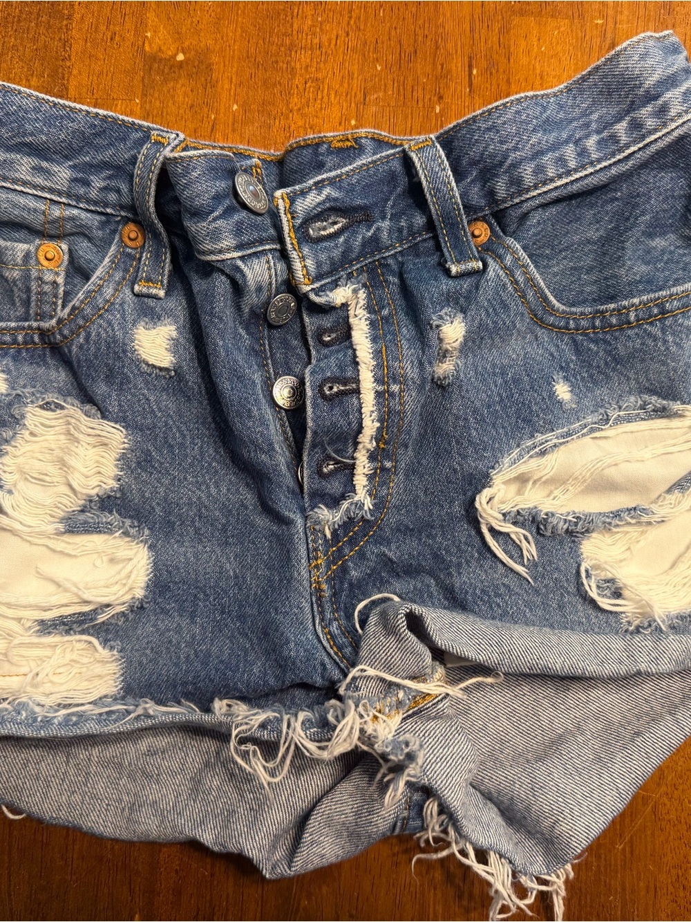 Levi's Distressed Light Blue Button-Fly Denim Shorts
